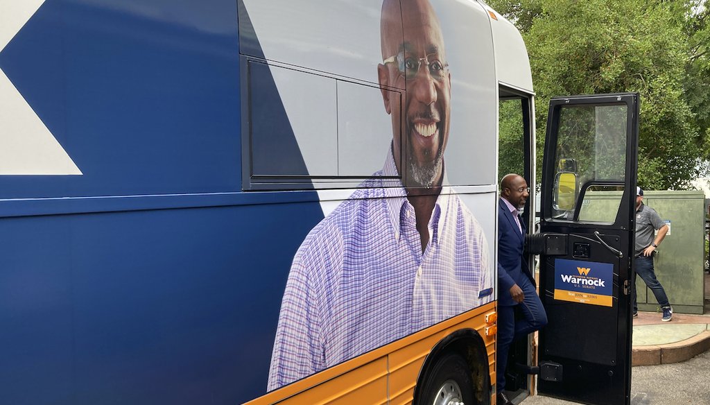 Sen. Raphael Warnock, D-Ga., arrives for a rally in Conyers, Ga., on Aug. 18, 2022. (AP/Jeff Amy)