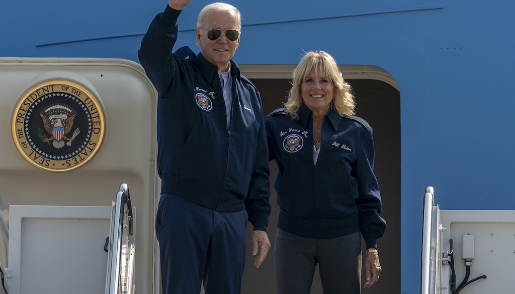 President Joe Biden waves as first lady Jill Biden watches from the steps of Air Force One on Sept. 17, 2022. (AP)