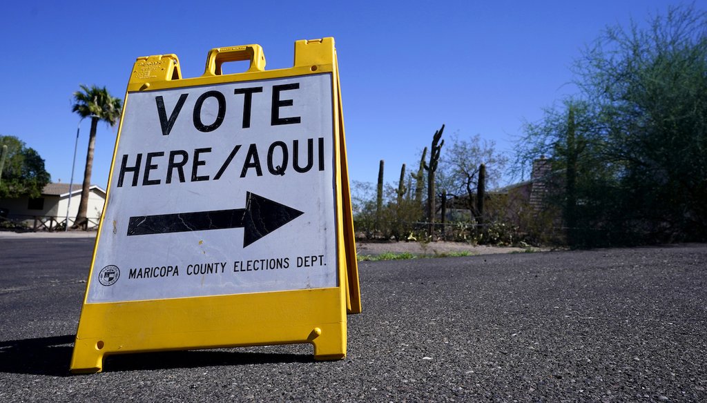 A sign marks the entrance to a voting precinct on the first day of early voting in the general election in Phoenix, Oct. 12, 2022.  (AP)
