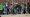 A Border Patrol agent checks the line formed by migrants before letting a group enter into El Paso, Texas from Ciudad Juarez, Mexico, on Dec. 21, 2022. (AP)