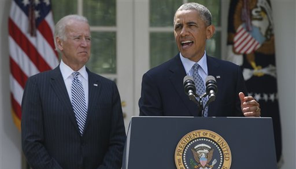 President Barack Obama stands with Vice President Joe Biden as he speaks about immigration in the Rose Garden at the White House, June 30, 2014. (AP/Charles Dharapak)