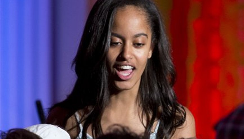 Malia Obama talks with people in the audience during an Independence Day celebration in the East Room of the White House, in Washington, Monday, July 4, 2016, for members of the military and their families. (AP Photo/Carolyn Kaster)