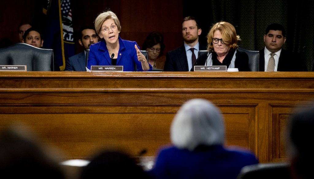 Sen. Elizabeth Warren, D-Mass., and Sen. Heidi Heitkamp, D-N.D., question Federal Reserve Chair Janet Yellen during a Senate Banking Committee hearing on Feb. 14, 2017.