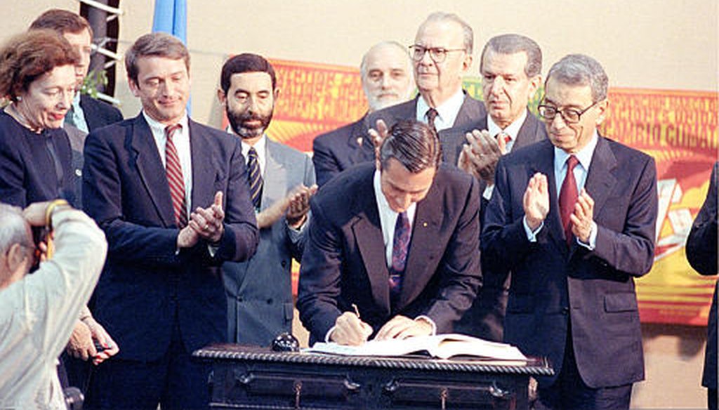 Brazil's then-President Fernando Collor de Mello signs the framework convention on climate change at the United Nations Conference on Environment and Development in Rio de Janeiro in 1992. (AP)