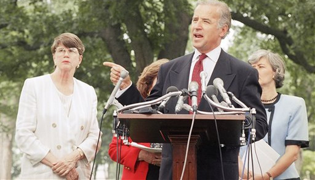 Then-Sen. Joseph Biden, D-Del., flanked by Attorney General Janet Reno, left, and Rep. Patricia Schroeder, D-Colo., promotes the Violence Against Women Act on July 19, 1994, prior to its passage that year. (AP)