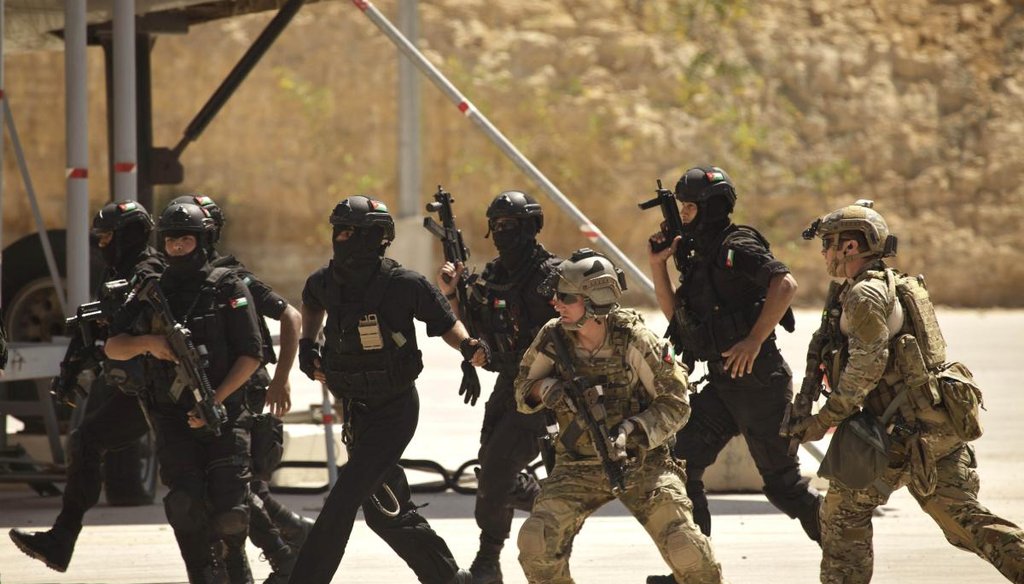 Special operations forces from Jordan and the United States conduct a combined demonstration with commandos from Iraq in Amman, Jordan, on June 20, 2013. (AP file photo) 