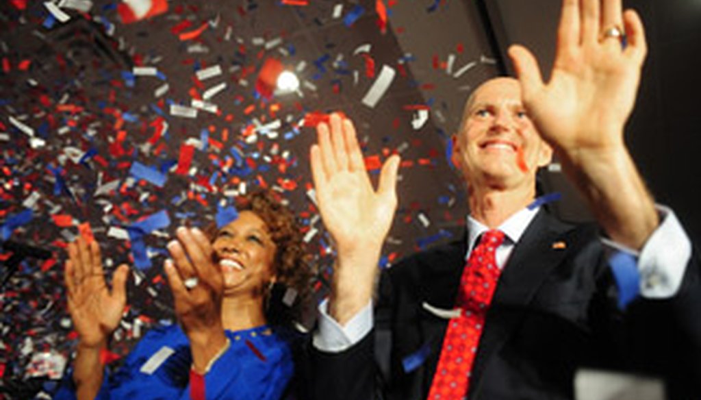Florida Gov.-elect Rick Scott and Lt. Gov.-elect Jennifer Carroll wave to the crowd after Scott's acceptance speech Nov. 3, 2010.