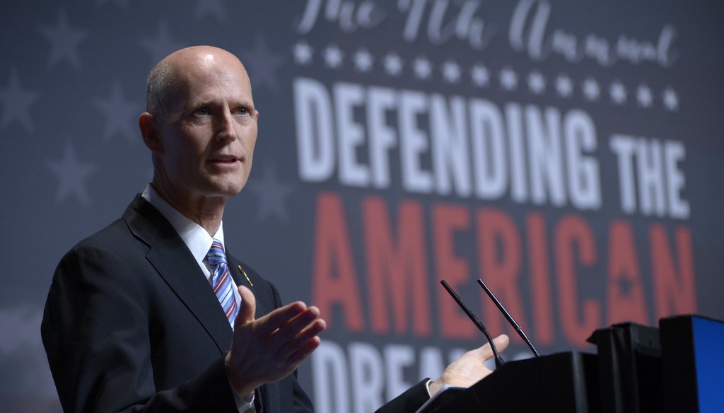 Gov. Rick Scott speaks at the Americans for Prosperity Foundation's Defending the Dream Summit on Aug. 30. Photo by Associated Press.
