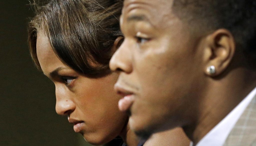 Janay Rice, left, looks on as her husband, former Baltimore Ravens running back Ray Rice, speaks to the media during a May 23, 2014, news conference. (AP)