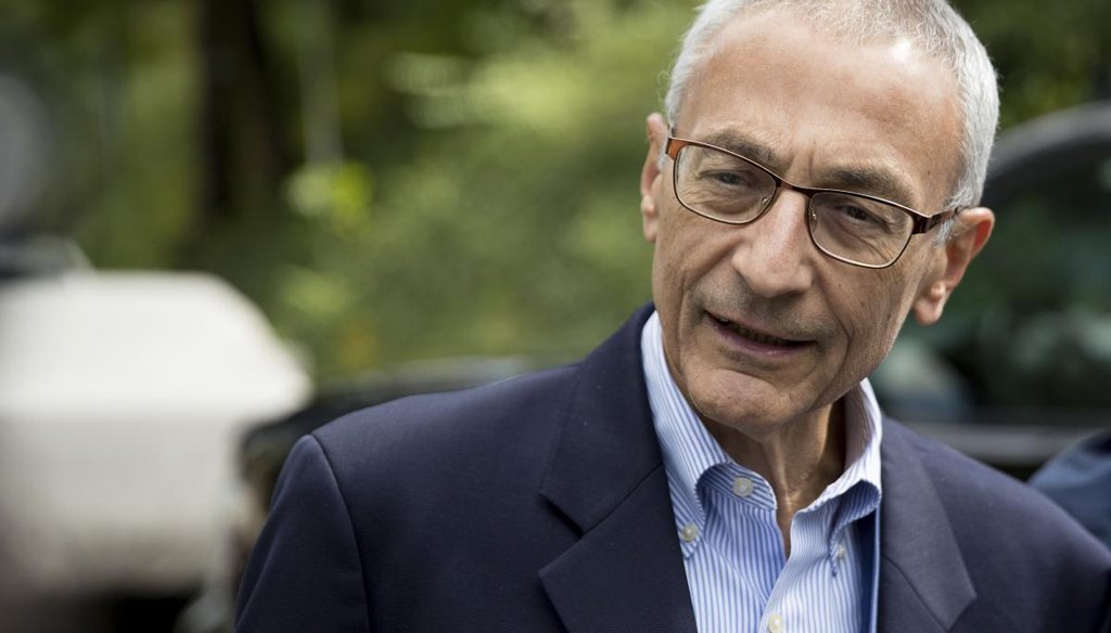 Hillary Clinton's campaign manager John Podesta speaks to members of the media outside Democratic presidential candidate Hillary Clinton's home in Washington. (AP)