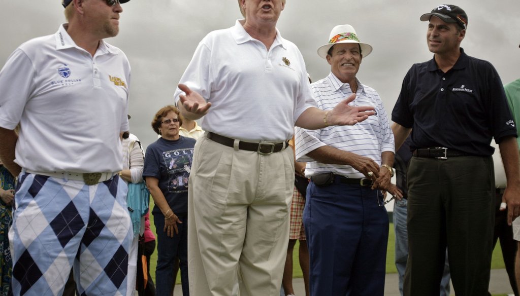 Donald Trump — shown with pros John Daly, Chi-Chi Rodríguez and Rocco Mediate, from left, at Puerto Rico’s Trump International Golf Club in 2010. (AP)
