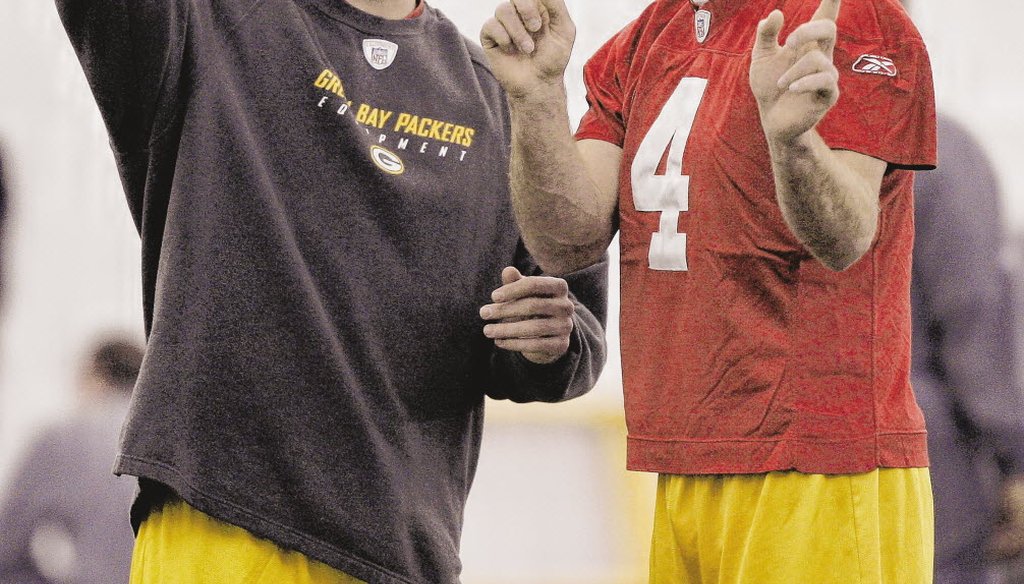 Aaron Rodgers (left) eventually succeeded Brett Favre as quarterback of the Green Bay Packers. (AP photo)