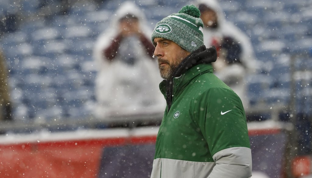 New York Jets quarterback Aaron Rodgers walks onto the field before the start of an NFL football game against the New England Patriots on Jan. 7, 2024, in Foxborough, Mass. (AP)