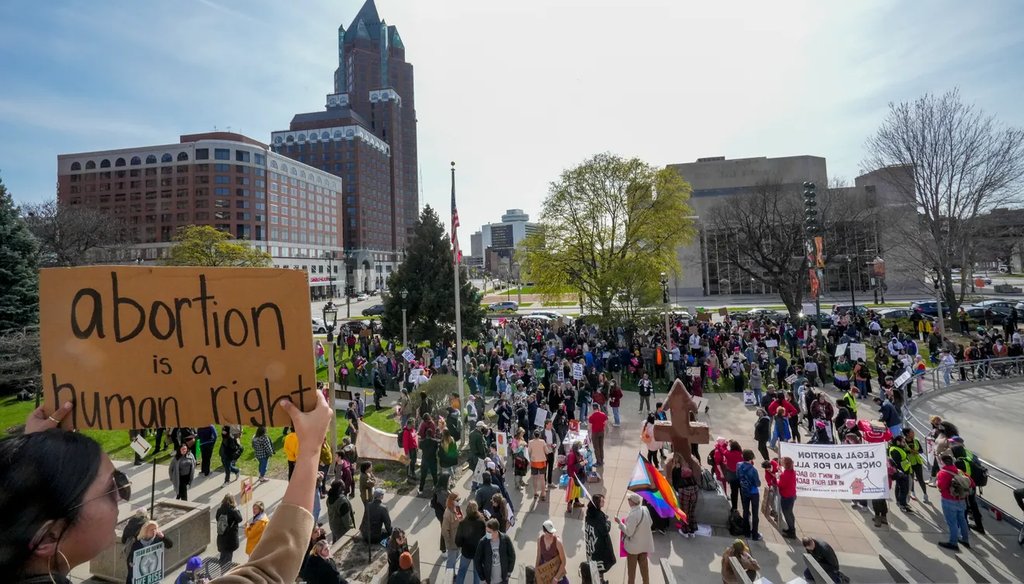 First grade teacher Gabrielle Strasser holds a sign prior to the rally and march for abortion rights May 4, 2022, at Red Arrow Park in Milwaukee. "I'm here for the future, so my students have a choice," she said. (Ebony Cox/Milwaukee Journal Sentinel).