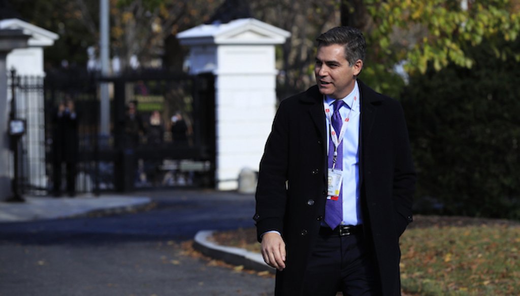 CNN's Jim Acosta walks on the North Lawn driveway upon returning back to the White House in Washington, Friday, Nov. 16, 2018. (AP)