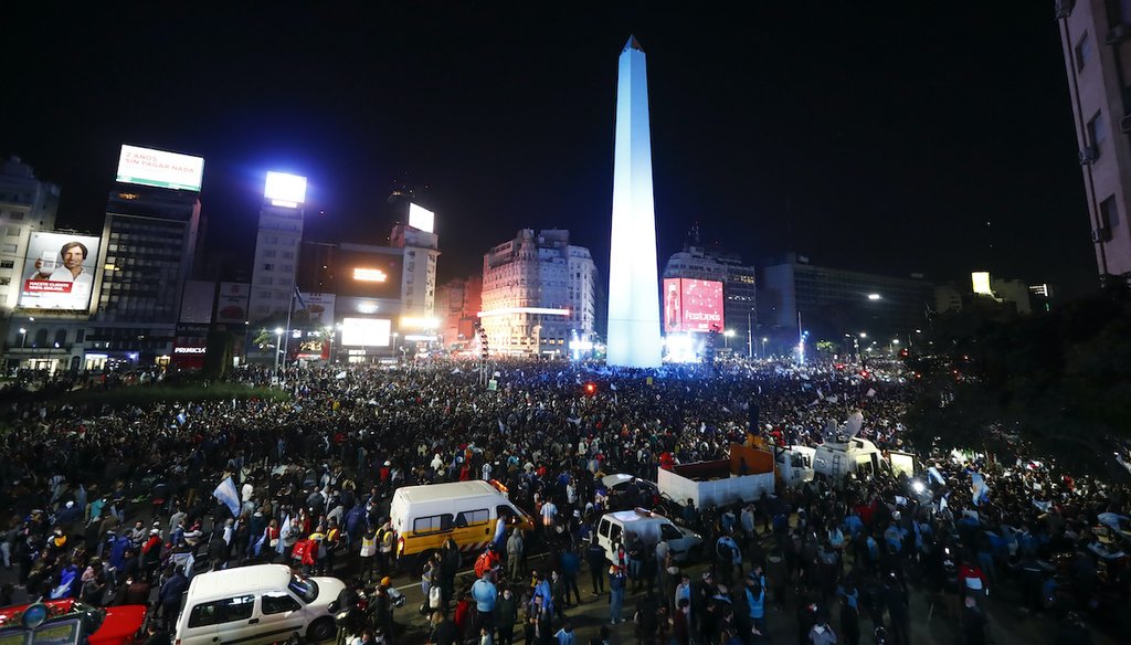 Argentina fans celebrate winning the Copa America final soccer match against Brazil in Buenos Aires, Argentina, Saturday, July 10, 2021. A video from the scene is being miscaptioned on social media as if it shows Cuba protests. It does not. (AP)