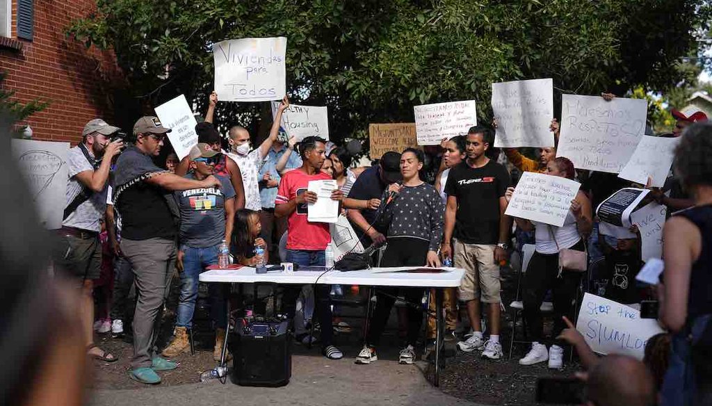 A rally is staged by the East Colfax Community Collective to address chronic problems in the apartment buildings occupied by people displaced from their home countries in central and South America on Sept. 3, 2024, in Aurora, Colo. (AP)