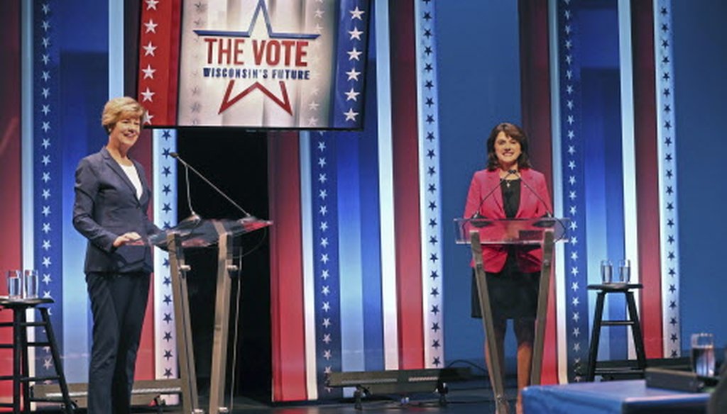Democratic Sen. Tammy Baldwin (left) and Republican challenger Leah Vukmir  stand onstage before the start of the U.S. Senate debate at the University of Wisconsin-Milwaukee campus Oct. 8, 2018. (Michael Sears/Milwaukee Journal Sentinel)