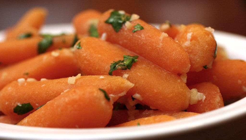 A dish of cooked baby carrots is served, Jan. 22, 2008. Despite claims, baby carrots do not cause cancer. (AP)