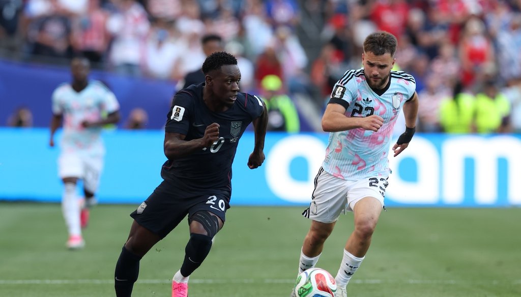 United States' Folarin Balogun (20) controls the ball against Belgium's Nicolas Raskin (23) during the World Cup round of 16 soccer match between the United States and Belgium in Seattle, July 6, 2026. (AP)