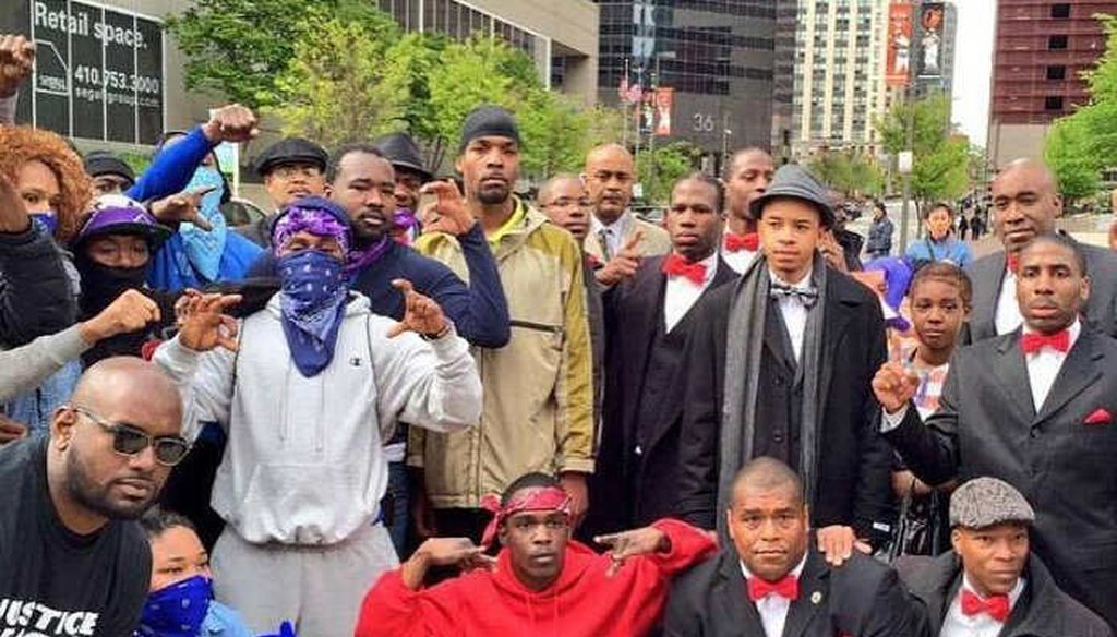 Representatives of the Nation of Islam and two gangs, the Crips and the Bloods, at a rally against police violence in Baltimore, Md.
