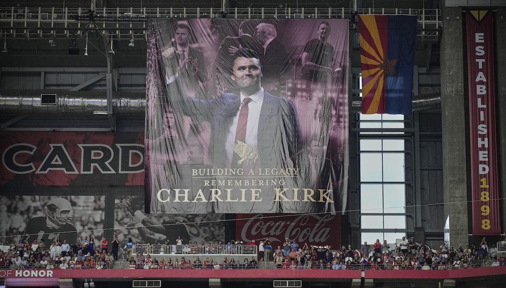 A banner for conservative activist Charlie Kirk is seen during a memorial service for Kirk, Sept. 21, 2025, at State Farm Stadium in Glendale, Ariz. (AP)
