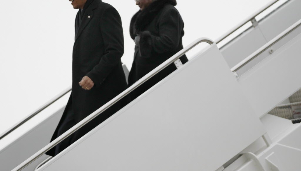 President Barack Obama and U.S. Rep. Gwen Moore (D-Wis.) exit Air Force One at General Mitchell International Airport in Milwaukee on Jan. 30, 2014. 