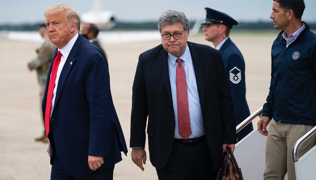 President Donald Trump and  Attorney General William Barr arrive at Andrews Air Force Base . (AP Photo/Evan Vucci)