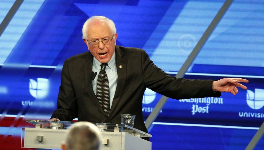 U.S. Sen. Bernie Sanders attacked Hillary Clinton's opposition to driver's licenses for illegal immigrants during a debate at Miami Dade College March 9. (Associated Press)