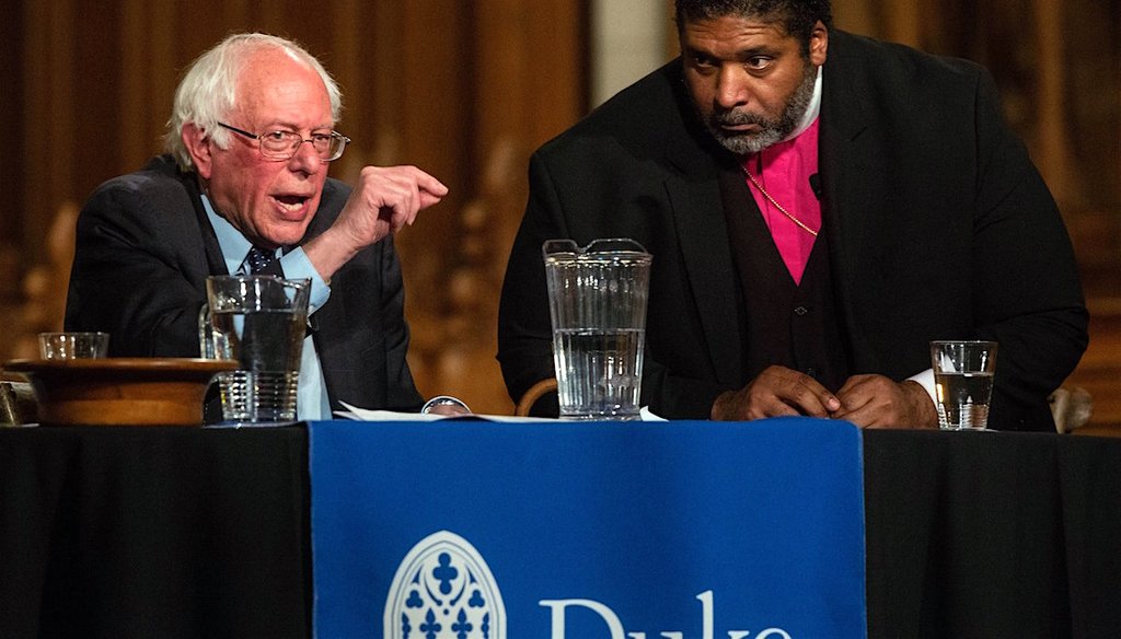 U.S. Sen. Bernie Sanders, left, and the Rev. William Barber II speak in a public forum on April, 19, 2018 at Duke Chapel in Durham. (via Travis Long/The News & Observer)