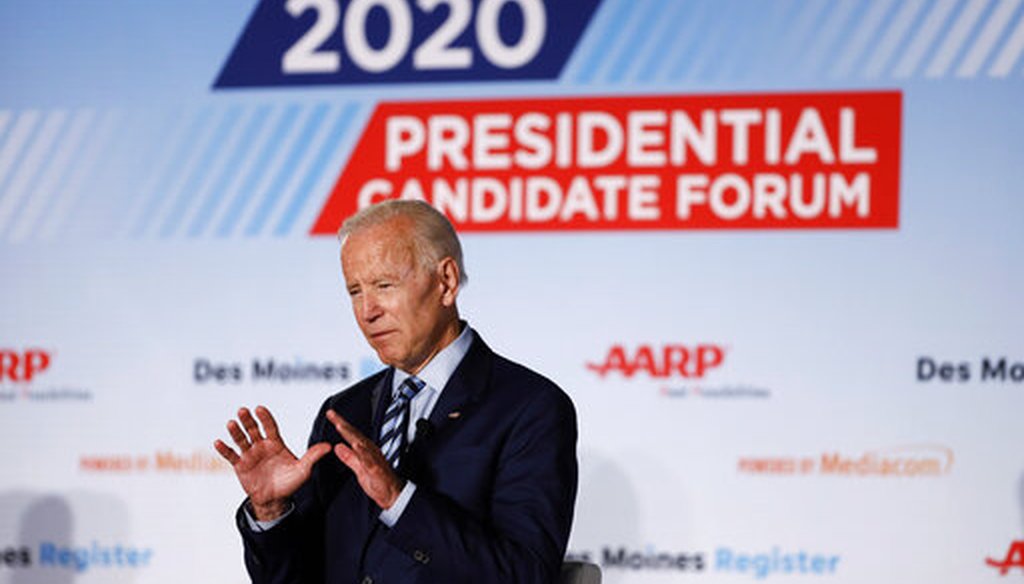 Democratic presidential candidate Joe Biden describes his healthcare plan during a presidential candidates forum sponsored by AARP and The Des Moines Register in Iowa. (AP Photo/Charlie Neibergall)