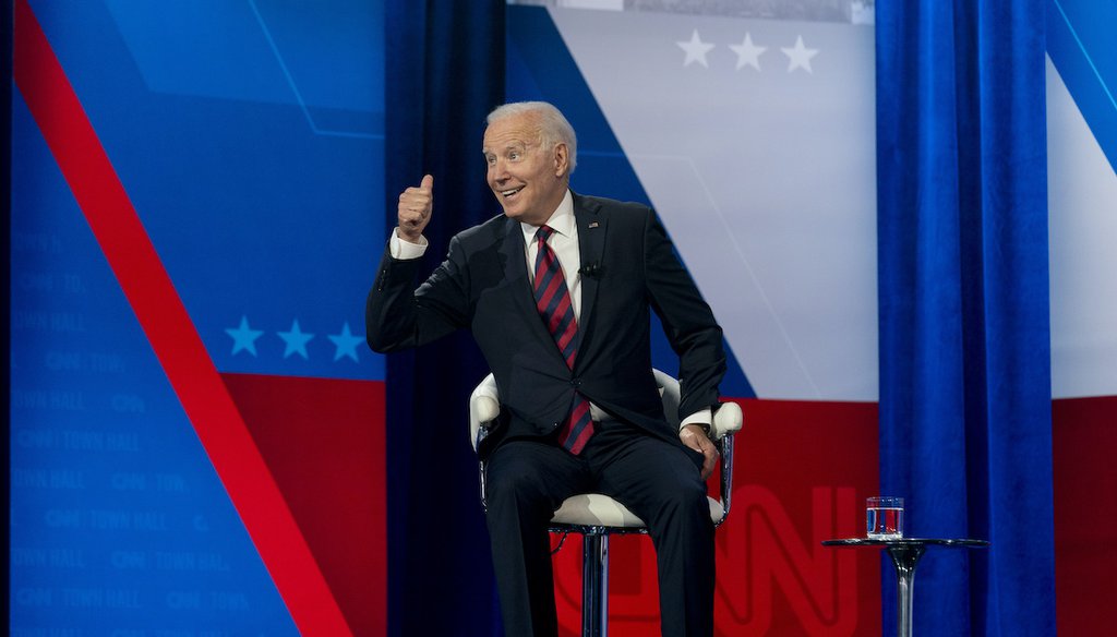 President Joe Biden interacts with members of the audience during a commercial break for a CNN town hall at Mount St. Joseph University in Cincinnati, Wednesday, July 21, 2021. (AP)