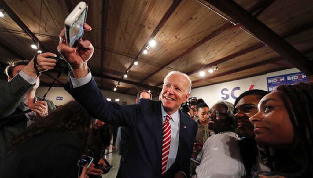 Democratic presidential candidate, former Vice President Joe Biden, takes a photo with a supporter's camera after speaking at a campaign event in Columbia, S.C., Tuesday, Feb. 11, 2020. (AP)