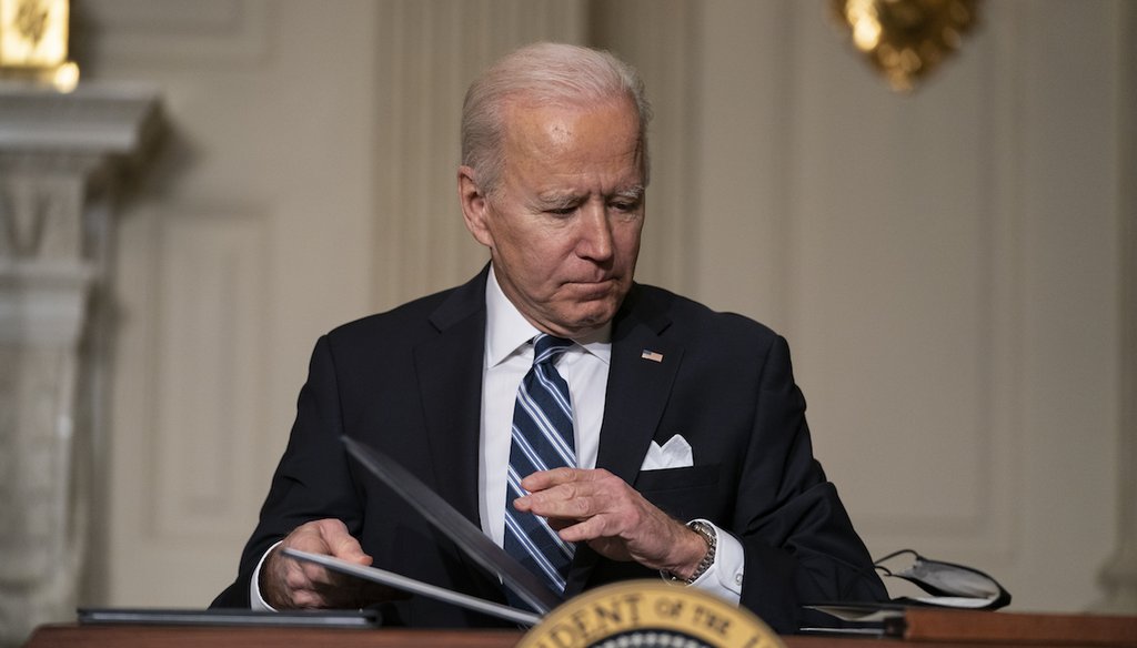 President Joe Biden signs a series of executive orders on climate change. (AP Photo/Evan Vucci)