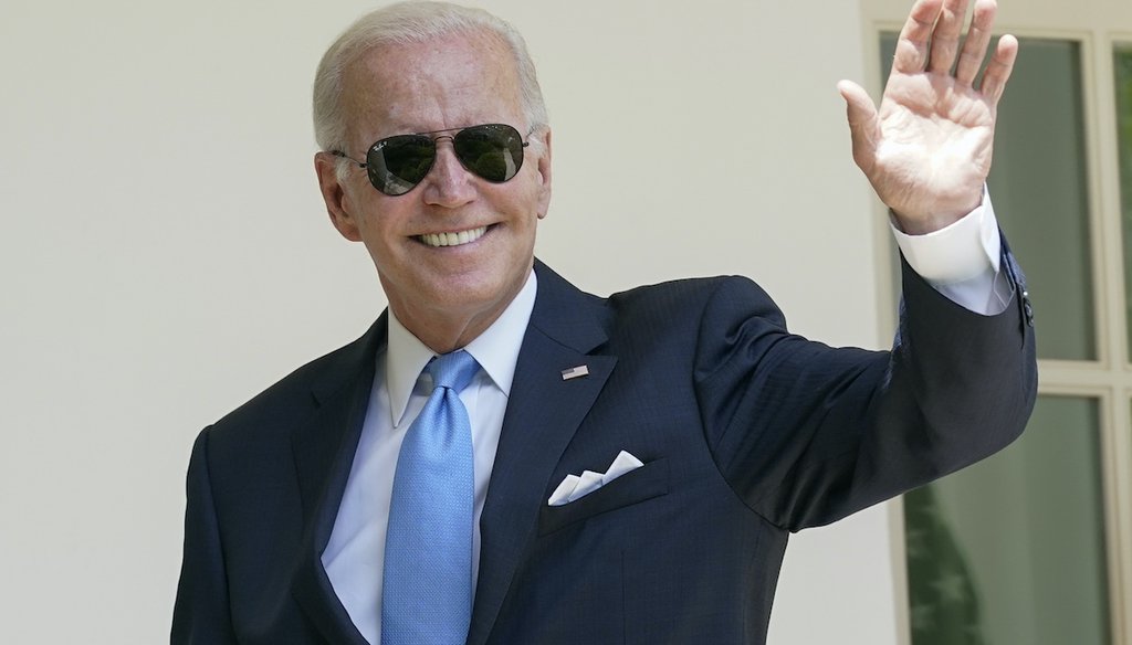 President Joe Biden waves after finishing his speech in the Rose Garden of the White House. Biden tested negative for COVID-19 on Tuesday night and again on Wednesday, and ended his quarantine period. July 27, 2022 (AP)