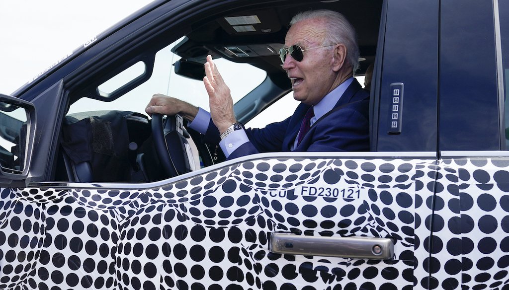 President Joe Biden test drives a Ford F-150 Lightning truck on Tuesday, May 18, 2021 (AP)