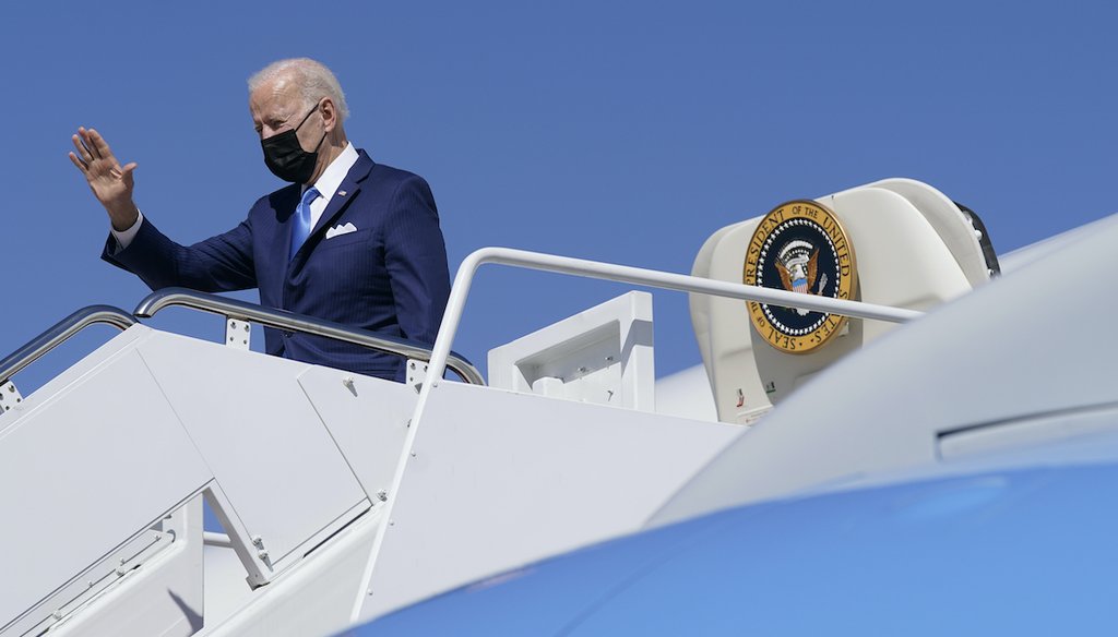 President Joe Biden waves as he boards Air Force One at Andrews Air Force Base, Md., Friday, March 26, 2021. Biden is spending the weekend at his home in Delaware. (AP)