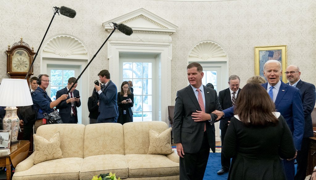 President Joe Biden, accompanied by Labor Secretary Marty Walsh, center right, speaks in the Oval Office of the White House, Thursday, Sept. 15, 2022, in Washington. (AP)