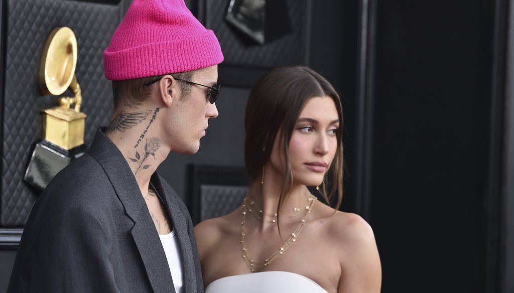 Justin Bieber, left, and Hailey Bieber arrive at the 64th Annual Grammy Awards at the MGM Grand Garden Arena on Sunday, April 3, 2022, in Las Vegas. (Photo by Jordan Strauss/Invision/AP)
