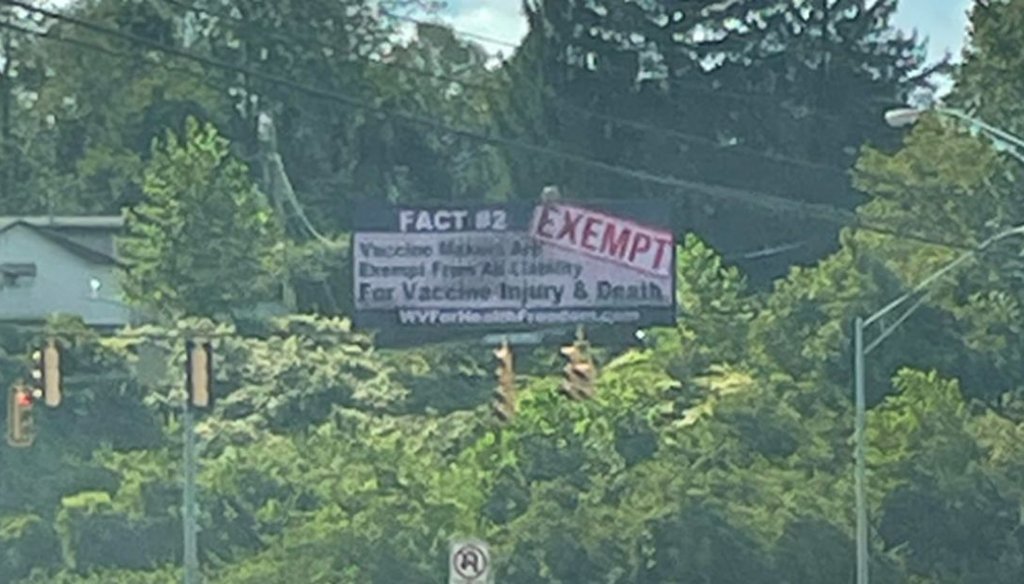 A billboard sponsored by the group West Virginians for Health Freedom in Morgantown, W.Va., on Aug. 29, 2025. (Natalie Ribar)