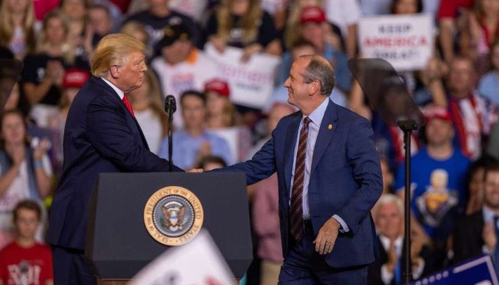 NC Sen. Dan Bishop of Mecklenburg County shakes hands with President Donald Trump before speaking Wednesday, July 17, 2019 at a rally in Greenville, NC. Bishop ran for Congress against Democrat Dan McCready in North Carolina's 9th District and won.