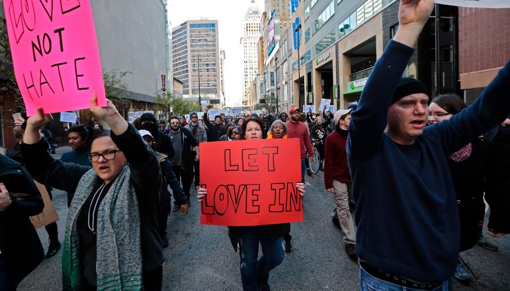 Separate protests from Black Lives Matter and another group rallying against President-Elect Donald Trump combine to march in Cincinnati on Nov. 12, 2016. (USA Today Network)