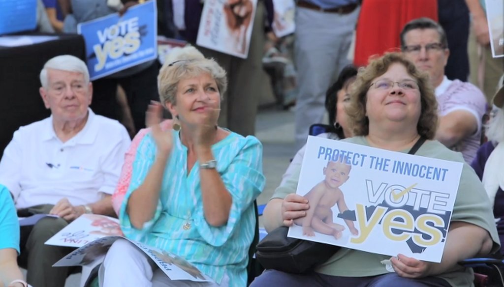 A group of about 200 people gathered near the Legislative Building Tuesday evening to urge members of the N.C. House follow their state Senate counterparts and override Gov. Roy Cooper’s veto of Senate Bill 359.