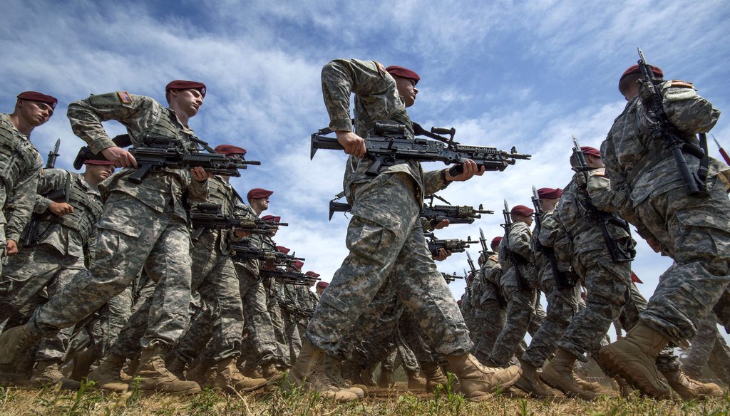 United States Army soldiers march at Fort Bragg during a review in 2014