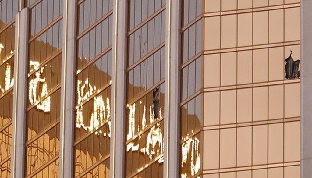 Broken windows are seen on a high floor of the Mandalay Bay hotel in Las Vegas following a mass shooting on Oct. 1, 2017. (Paul Buck/EPA-EFE)