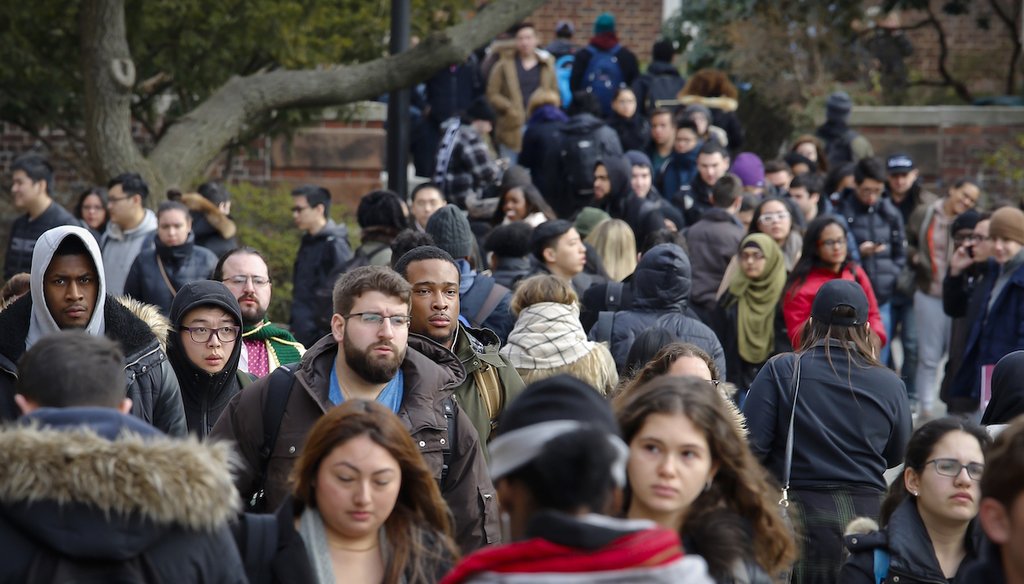 Brooklyn College students walk between classes on campus in New York in 2017. (AP)
