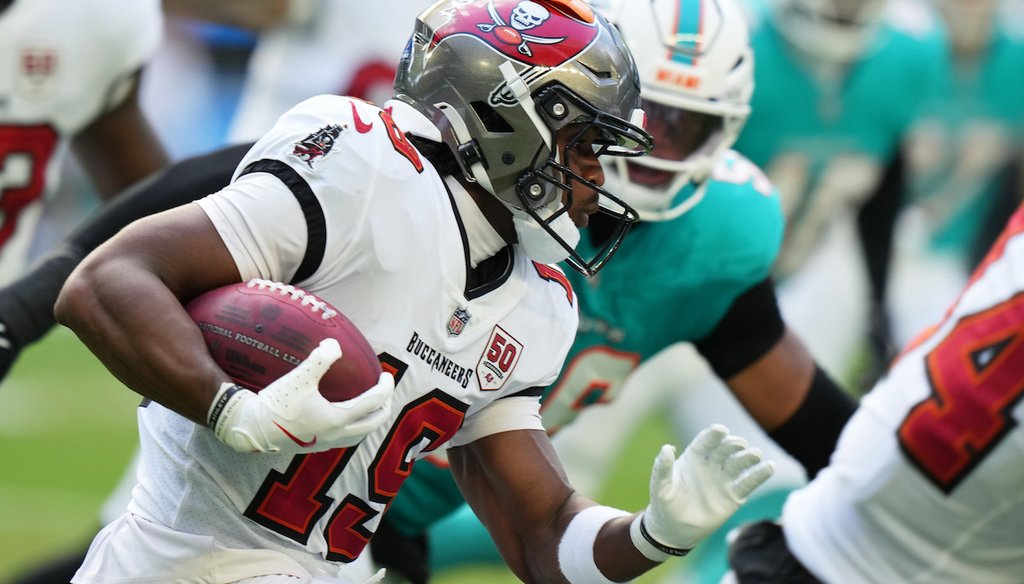 Tampa Bay Buccaneers wide receiver Kameron Johnson runs back a kick return during the first half of an NFL football game against the Miami Dolphins, Dec. 28, 2025, in Miami Gardens, Fla. (AP)