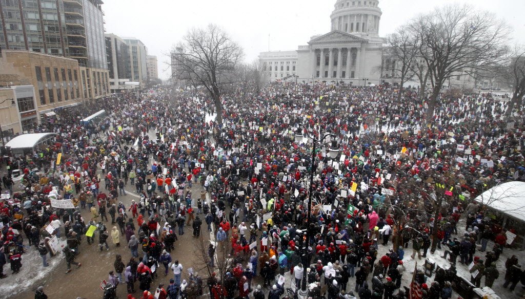 Thousands of people gather outside the Capitol in Madison to protest Wisconsin Gov. Scott Walker's budget-repair bill