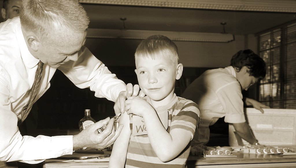 A boy receives a measles vaccination in 1962 at the Fernbank Elementary School in Atlanta, Georgia. (Centers for Disease Control and Prevention's Public Health Image Library)
