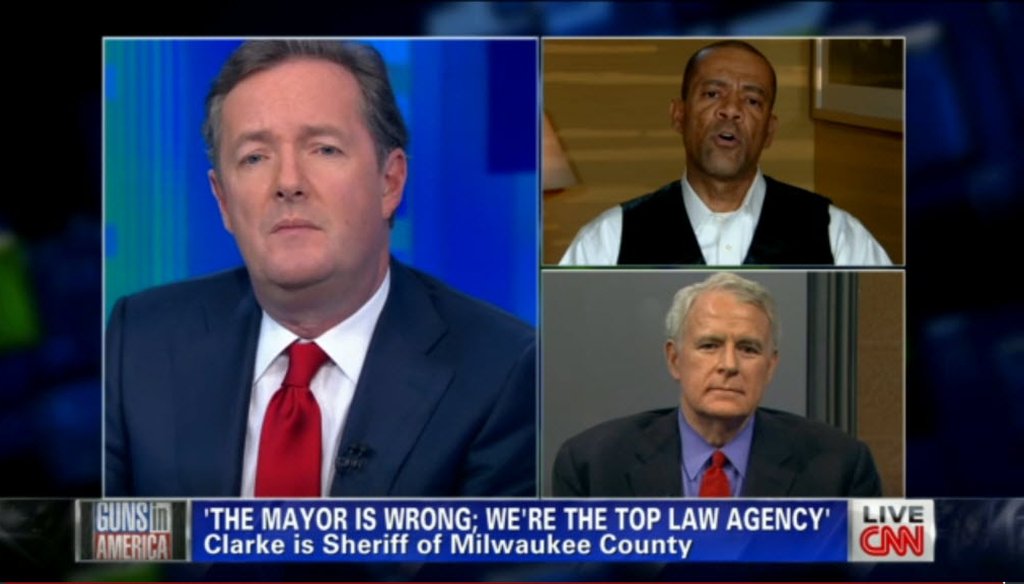 After Milwaukee County Sheriff David A. Clarke Jr. (top right) aired a controversial radio ad about crime, he and Milwaukee Mayor Tom Barrett (bottom right) were interviewed by CNN talk show host Piers Morgan on Jan. 29, 2013.